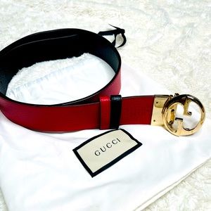 SOLD / Authentic Gucci Belt Black & Red reversible with Gold buckle .